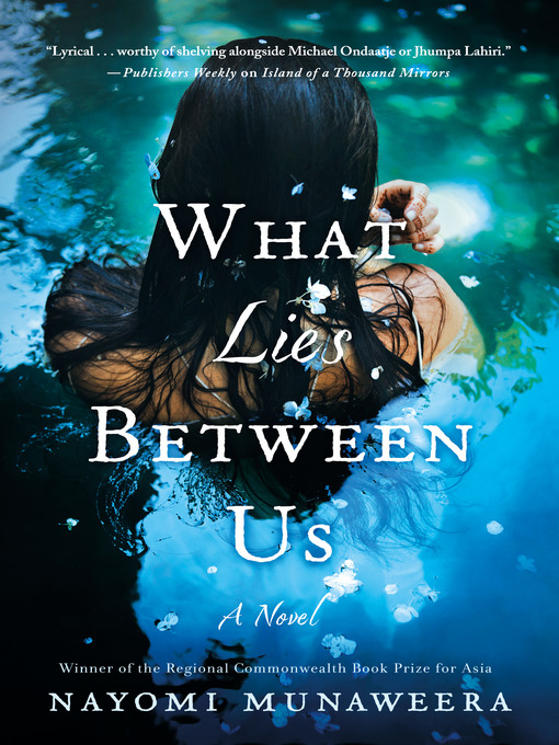 Title details for What Lies Between Us by Nayomi Munaweera - Wait list